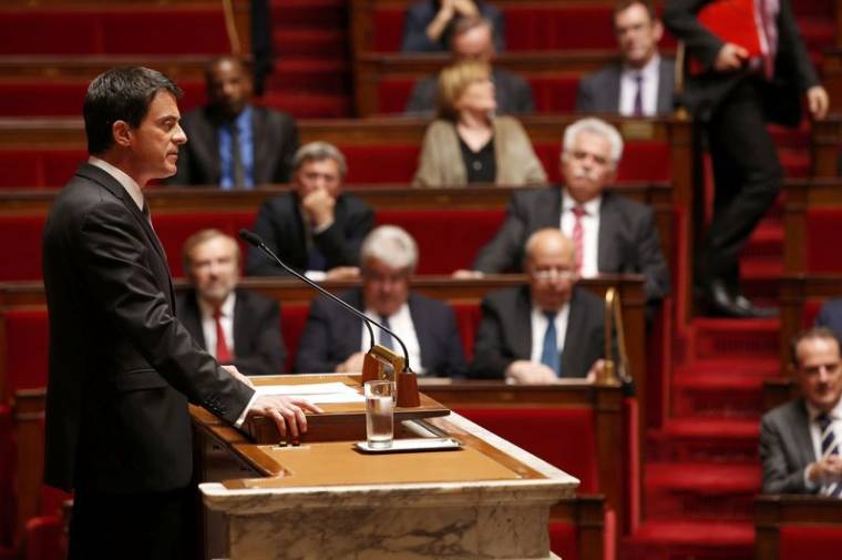 French Prime Minister Manuel Valls delivers a speech to use the article 49.3 and impose by decree a labour law reform bill, during its second hearing at the National Assembly in Paris