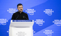 Le président ukrainien Volodymyr Zelensky s'adresse aux participants du Forum économique de Davos, mardi 21 janvier 2025  ( AFP / FABRICE COFFRINI )