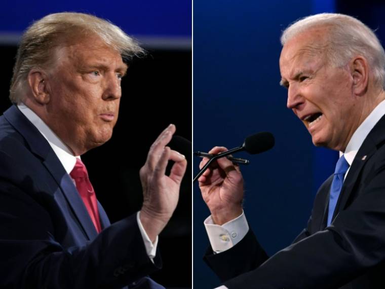 Combinaison d'images créée le 22 octobre 2020: l'ancien président américain Donald Trump (G) et l'actuel président américain Joe Biden (D) lors du dernier débat présidentiel de 2020 à Nashville (Tennessee), aux Etats-Unis, le 22 octobre 2020 ( AFP / Brendan Smialowski )