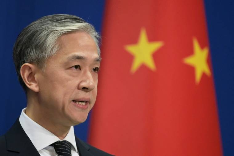 Wang Wenbin, porte-parole de la diplomatie chinoise, le 9 novembre 2020 à Pékin ( AFP / GREG BAKER )