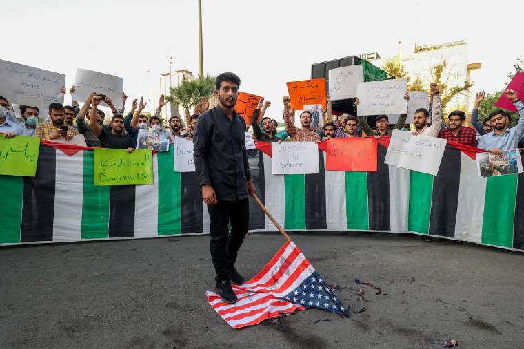Une manifestation hostile aux Etats-Unis à Téhéran, le 16 juillet 2022. ( AFP / ATTA KENARE )