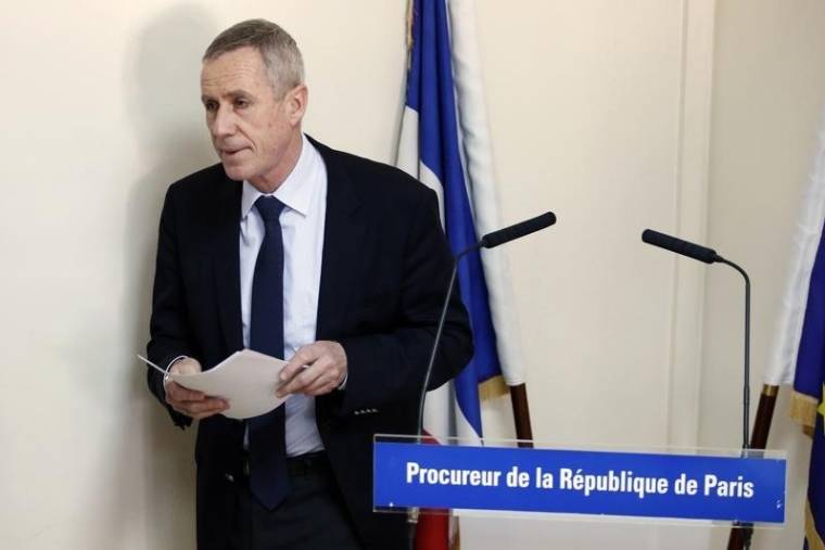 Paris prosecutor Francois Molins leaves a news conference at the courthouse in Paris