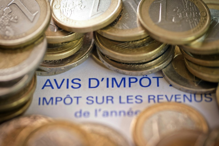 Les Français ne paieront pas davantage d'impôt sur le revenu au 1er janvier 2025 malgré l'absence d'indexation sur l'inflation du barème ( AFP / JOEL SAGET )