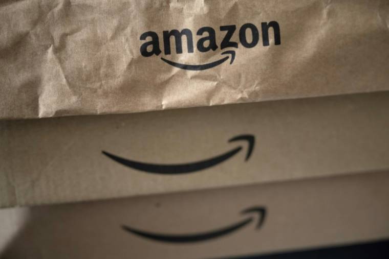 L'autorité italienne de la concurrence (ACGM) annonce avoir condamné deux entreprises du groupe Amazon à verser une amende de 10 millions d'euros pour pratiques commerciales déloyales ( AFP / MARCO BERTORELLO )
