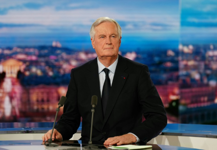 Le Premier ministre Michel Barnier sur le plateau du "20 Heures" de TF1 le 26 novembre 2024 ( AFP / Dimitar DILKOFF )