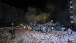 Les ruines d'un immeuble détruit par une frappe israélienne dans la banlieue sud de Beyrouth, le 27 septembre 2024 ( AFP / - )