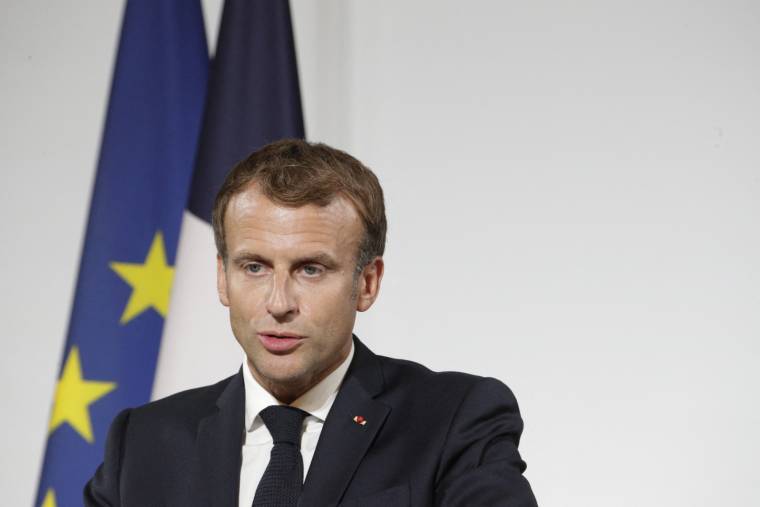 Emmanuel Macron, le 20 septembre à l'Elysée. ( POOL / STEFANO RELLANDINI )