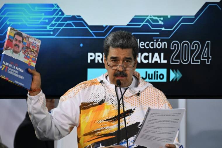 Le président vénézuélien Nicolas Maduro au siège du Conseil national électoral (CNE) lors de l'officialisation de sa candidature à la présidentielle, le 25 mars 2024 à Caracas ( AFP / Federico Parra )