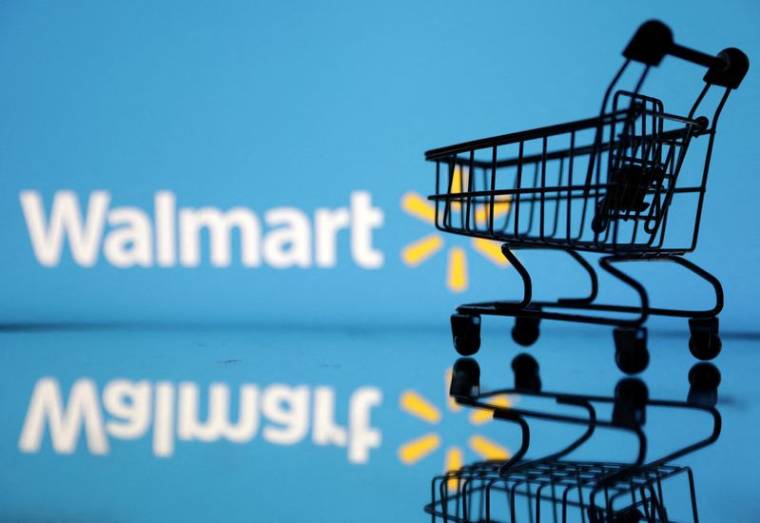 Illustration d'un caddie devant le logo Walmart