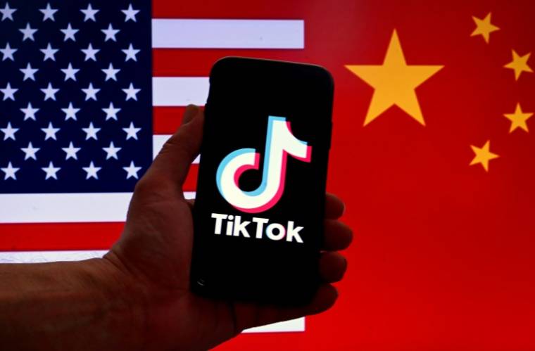 ByteDance, la maison mère chinoise de TikTok, annonce n'avoir aucune intention de vendre son application, malgré une nouvelle loi américaine qui l'oblige à couper tout lien avec la Chine sous peine d'interdiction aux Etats-Unis ( AFP / OLIVIER DOULIERY )