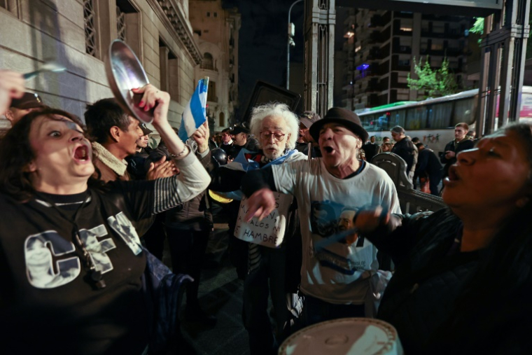 Manifestation contre la politique du président argentin Javier Milei, alors qu'il présente le projet de budget 2025 au Congrès, le 15 septembre 2024 à Buenos Aires  ( AFP / ALEJANDRO PAGNI )