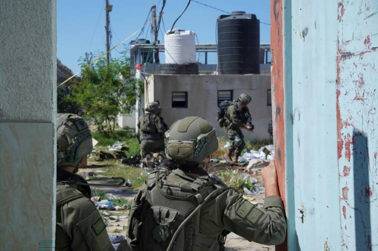 Photo diffusée par l'armée israélienne le 8 mai 2024 des forces israéliennes opérant à Rafah dans le sud de la bande de Gaza ( Israeli Army / - )
