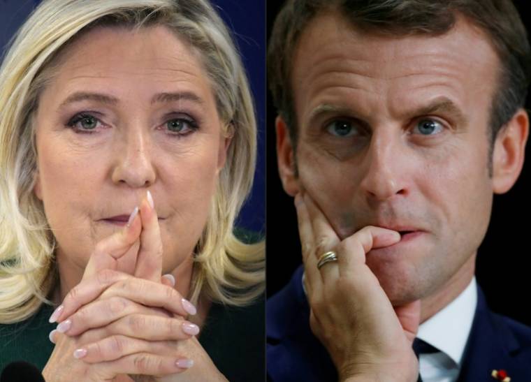 Photomontage de Marine Le Pen et Emmanuel Macron, alors en lice pour le second tour de l'élection présidentielle en France le 24 avril 2022 ( AFP / JULIEN DE ROSA )