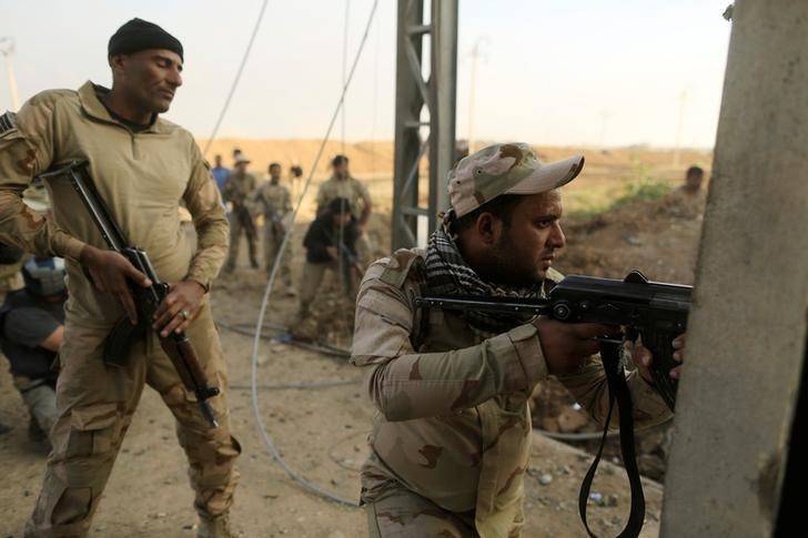LES FORCES IRAKIENNES DANS LA DERNIÈRE VILLE AU SUD DE MOSSOUL