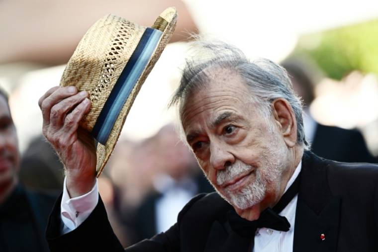 Le réalisateur américain Francis Ford Coppola arrive pour la projection de son film "Megalopolis" au 77e Festival de Cannes, le 16 mai 2024 ( AFP / LOIC VENANCE )