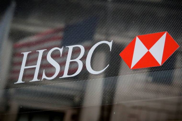 HSBC BAT LES ATTENTES AVEC UN BÉNÉFICE AVANT IMPÔTS EN HAUSSE DE 74% AU TROISIÈME TRIMESTRE