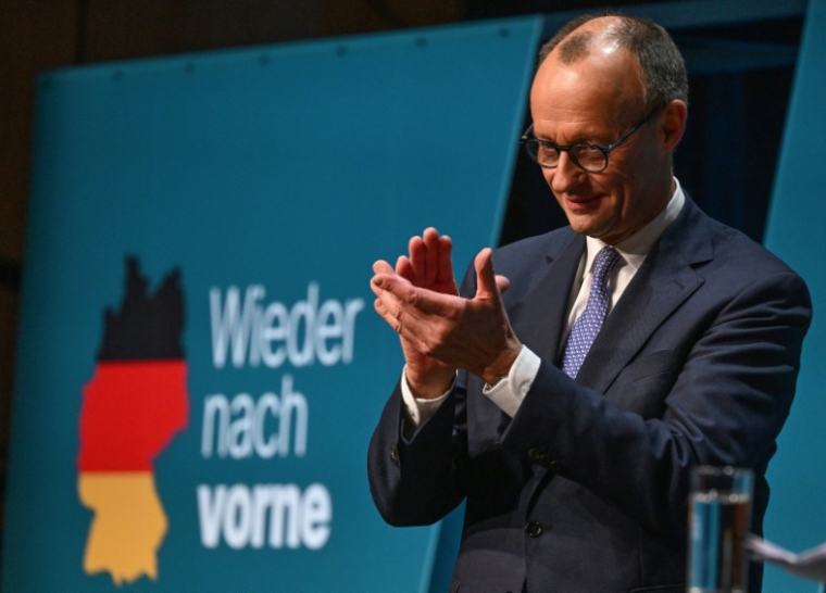 Friedrich Merz, chef de file de l'Union chrétienne-démocrate (CDU) et candidat au poste de chancelier, lors d'un meeting de campagne, le 20 février 2025 à Darmstadt ( AFP / Kirill KUDRYAVTSEV )