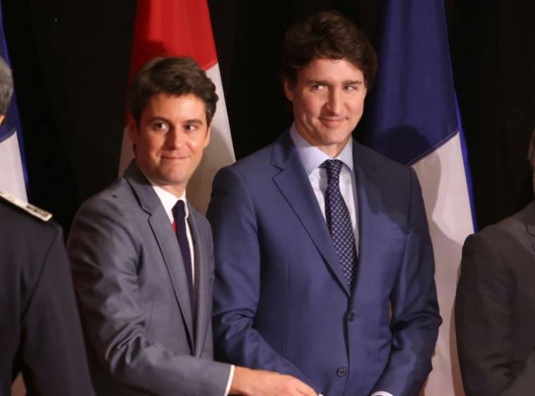 Le Premier ministre canadien Justin Trudeau (d) et son homologue français Gabriel Attal, le 11 avril 2024 à Ottawa ( AFP / PATRICK DOYLE )