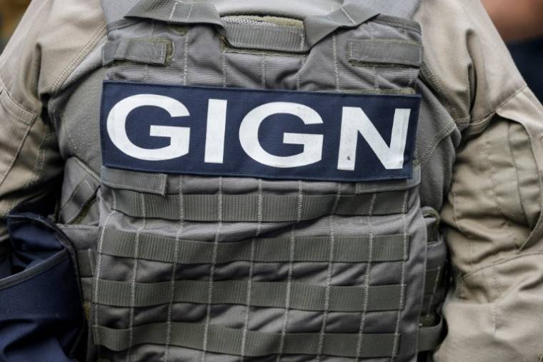 Un gendarme du GIGN en opération à Nouméa, lors de la visite du président Emmanuel Macron en Nouvelle-Calédonie le 23 mai 2024 ( POOL / Ludovic MARIN )