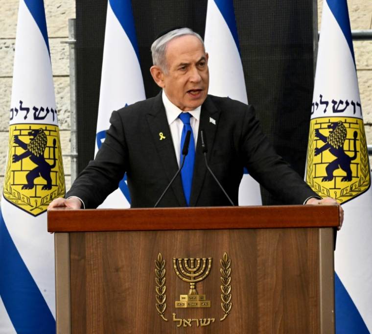 Le Premier ministre israélien Benjamin Netanyahu prononce un discours lors d'une cérémonie à Jérusalem à la veille du Jour du souvenir, journée annuelle d'hommage aux soldats tombés pour la défense d'Israël et aux victimes d'attentats, le 12 mai 2024 ( POOL / DEBBIE HILL )