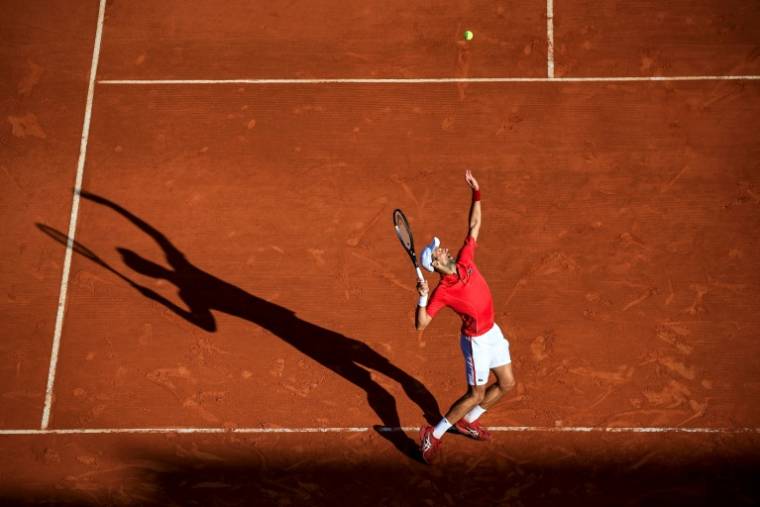 Le joueur de tennis serbe Novak Djokovic lors du match l'opposant à l'Australien Alex de Minaur lors du tournoi ATP de Monte-Carlo le 12 avril 2024. ( AFP / Valery HACHE )