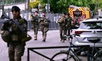 Des militaires en patrouille à proximité du consulat d'Iran à Paris, le 19 avril 2024 ( AFP / Miguel MEDINA )