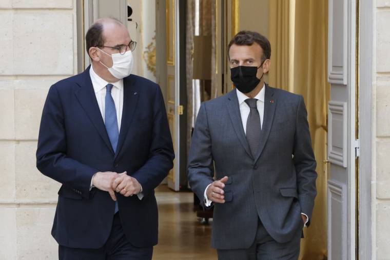 Jean Castex et Emmanuel Macron, le 9 juin 2021, à Paris ( POOL / LUDOVIC MARIN )