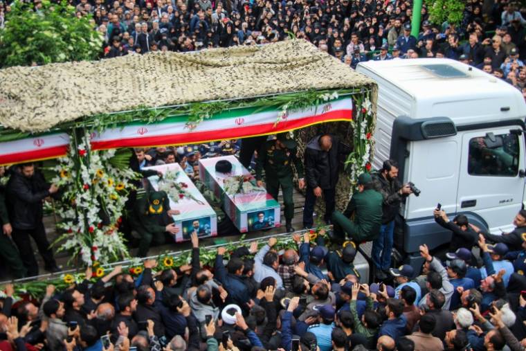Un convoi funéraire avec le cercueil des huit personnes décédées dans un crash d'hélicoptère, dont le président iranien Ebrahim Raïssi à Tabriz, le 21 mai 2024 ( FARS NEWS AGENCY / ATA DADASHI )