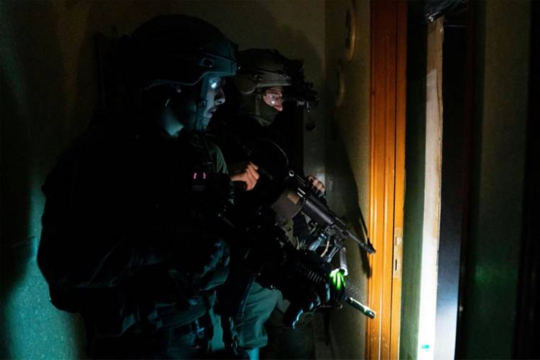 Des soldats israéliens en opération dans la bande de Gaza. Photo distribuée le 9 avril 2024 par l'armée israélienne ( Israeli Army / - )