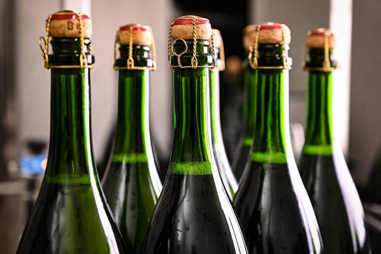 Des bouteilles de champagne.  ( AFP / BERTRAND GUAY )