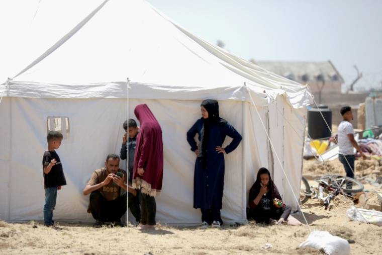 Déplacés palestiniens dans un camp de tentes à Khan Younès, dans le sud de la bande de Gaza, le 9 mai 2024 ( AFP / - )