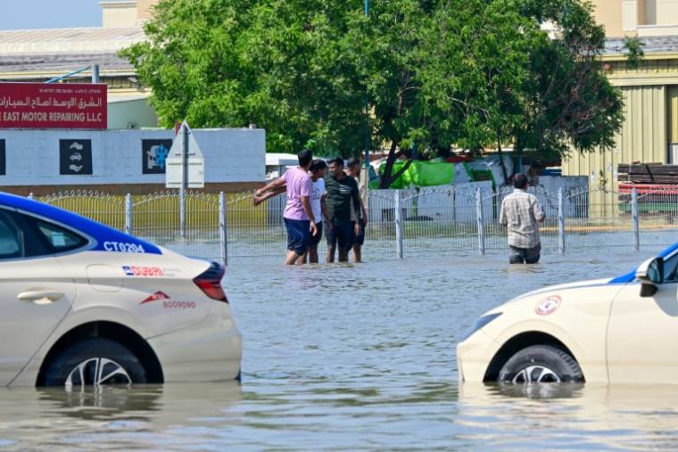 Inondations à Dubaï après des fortes pluies, le 18 avril 202 aux Emirats arabes unis  ( AFP / Giuseppe CACACE )
