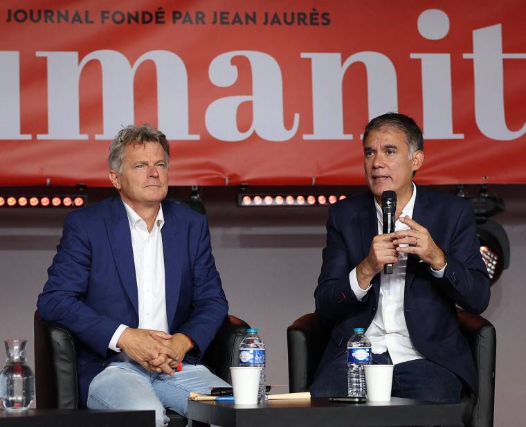 Fabien Roussel et Olivier Faure à Brétigny-sur-Orge, le 10 septembre 2022. ( AFP / THOMAS SAMSON )