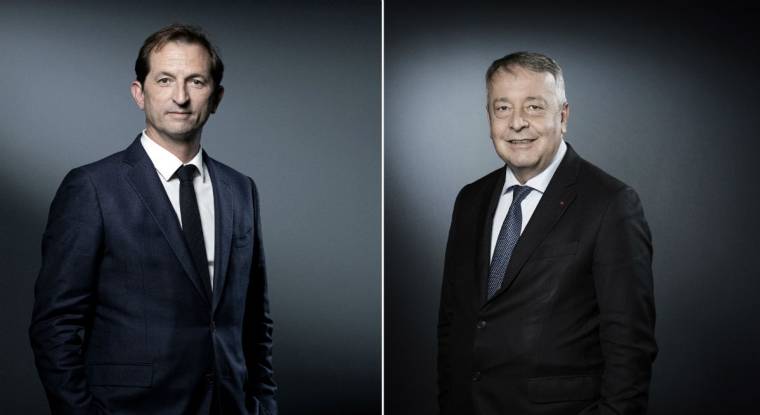Bertrand Camus, directeur général de Suez (à gauche) et Antoine Frérot, PDG de Veolia (à droite). (© J. Saget / AFP)
