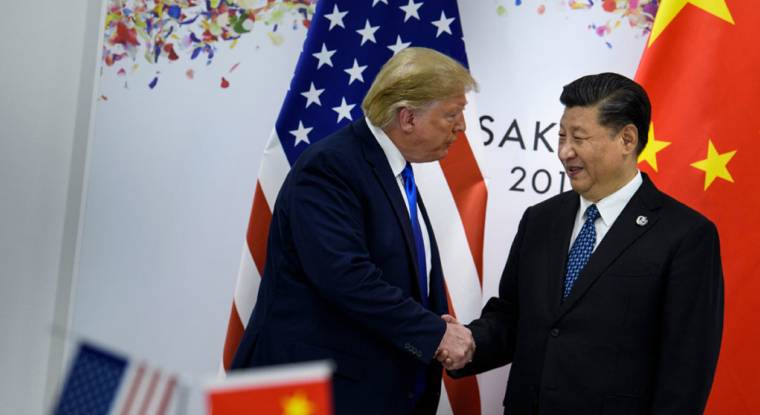 Faut-il croire à la poignée de main symbolique entre Donald Trump et Xi Jinping lors du G20, le 29 juin dernier ? (© B. Smialowski / AFP)