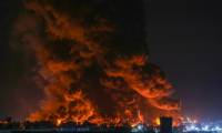 Un incendie dans une raffinerie de pétrole à Erbil, capitale du Kurdistan autonome, le 13 juin 2024 en Irak ( AFP / Safin HAMID )