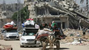 Des déplacés palestiniens arrivent à Khan Younès, dans le sud de la bande de Gaza, le 9 mai 2024 ( AFP / - )