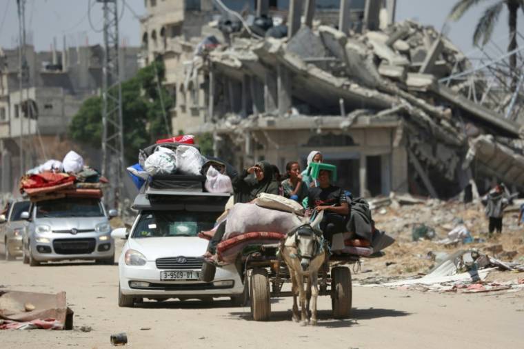 Des déplacés palestiniens arrivent à Khan Younès, dans le sud de la bande de Gaza, le 9 mai 2024 ( AFP / - )