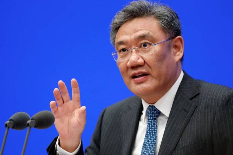 Le ministre chinois du Commerce, Wang Wentao, s'exprimant lors d'une conférence de presse à Pékin