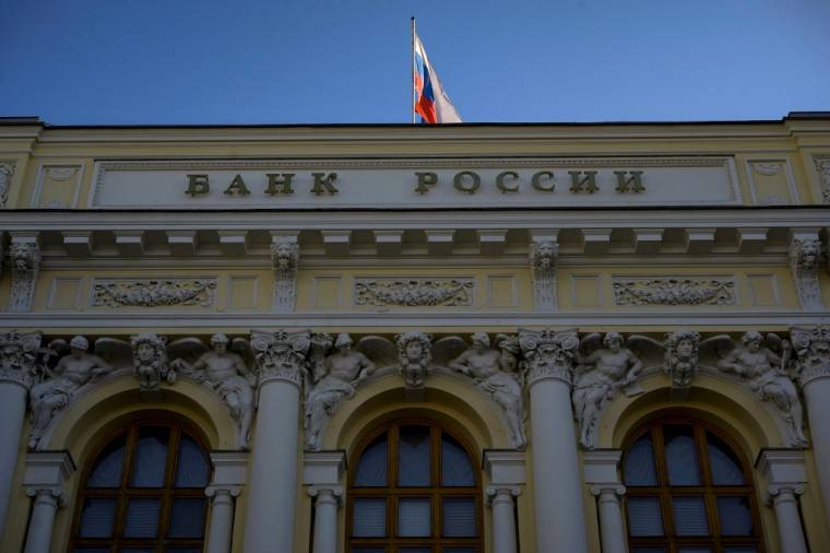 La BCR a aussi imposé des mesures drastiques sur l'achat de devises pour freiner la chute du rouble. ( AFP / NATALIA KOLESNIKOVA )