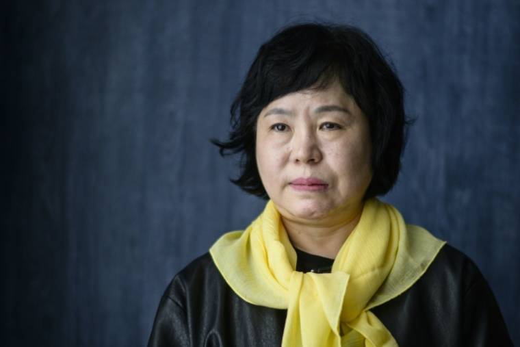 Park Jeong-hwa, mère de Cho Eun-jung, l'une de victimes du naufrage du ferry de Sewol survenu le 16 avril 2014, lors d'une interview avec l'AFP le 15 avril 2024 à Séoul ( AFP / ANTHONY WALLACE )