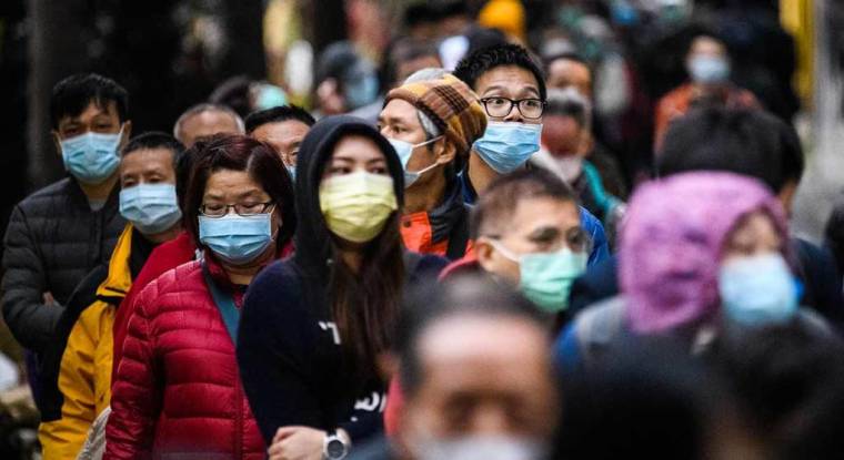 Les fermetures d'usines paralysent la deuxième économie mondiale. Le bilan de l'épidémie du coronavirus dépasse déjà celui du Sras. (© A. Wallace/AFP