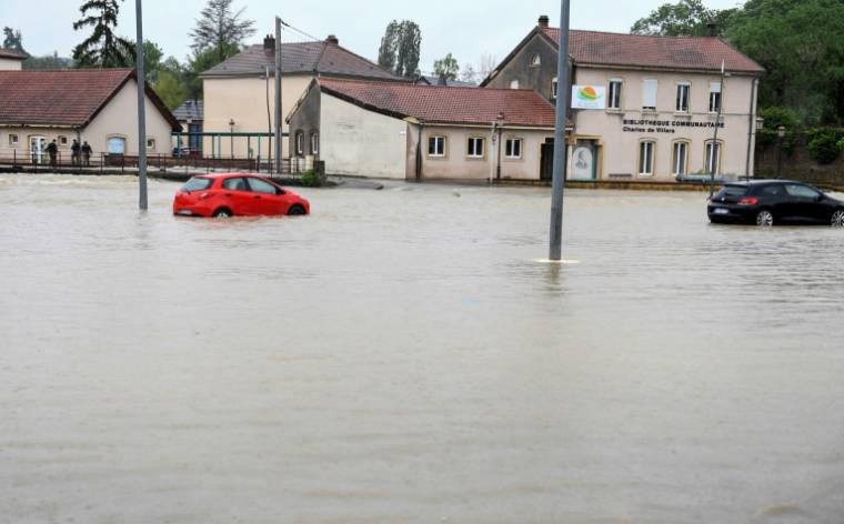 Les inondations à Boulay-Moselle, en Moselle, le 17 mai 2024 ( AFP / Jean-Christophe VERHAEGEN )