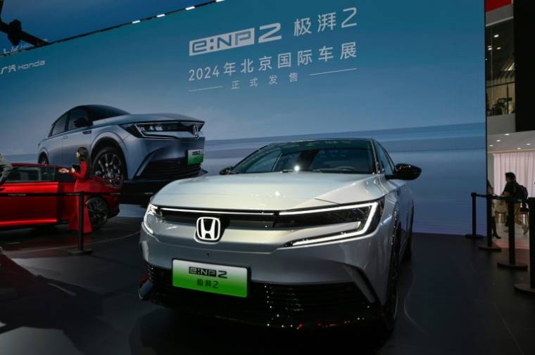 Un SUV électrique Honda e:NP2 exposé au Salon automobile Auto China, le 25 avril 2024 à Pékin ( AFP / Jade Gao )