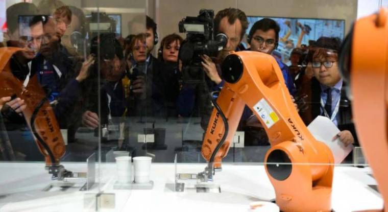 Un robot du fabricant allemand Kuka, convoité par le chinois Midea. (© T. Schwarz / AFP)