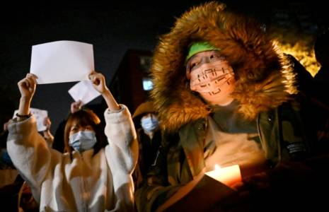 Manifestation contre la politique "zéro Covid" du gouvernement chinois, le 28 novembre 2022 à Pékin ( AFP / Noel CELIS )
