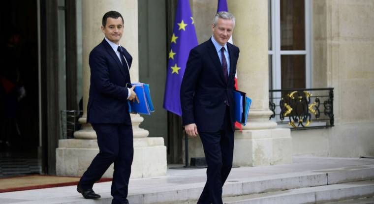 Le ministre de l'Économie Bruno Le Maire (à droite) et son homologue des Comptes publics Gérald Darmanin (à gauche) ont présenté ce mercredi 27 septembre le projet de loi de finances pour 2018. (© AFP / M. Bureau)
