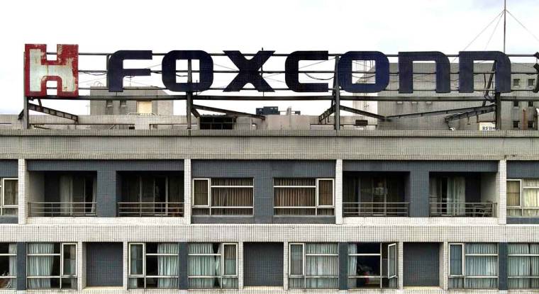 «L'usine du monde» Faxconn connaît des tensions, notamment dues à la politique «zéro covid». La production d'Iphone, fabriqués en Chine par Faxconn pour Apple, a pris du retard. Apple envisage de déplacer une partie de la production en Inde. (© AFP
