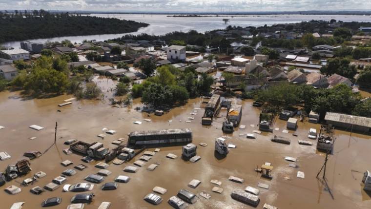Vue aérienne des inondations à Eldorado do Sul, dans l'Etat du Rio Grande do Sul, le 9mai 2024 au Brésil ( AFP / Carlos FABAL )