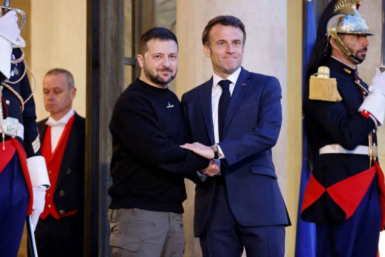 Volodymyr Zelensky et Emmanuel Macron à Paris, le 14 mai 2023. ( AFP / LUDOVIC MARIN )